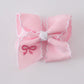 Pink embroidery hair bow