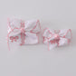 White embroidery hair bow