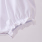 White cross smocked ruffle bubble
