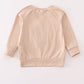 Beige turkey french knot top