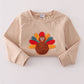 Beige turkey french knot top