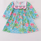 Green floral character applique dress