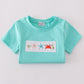 Blue marine creature embroidery smocked top