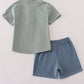 Green character applique shorts set