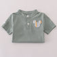 Green character applique shorts set