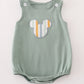 Green character applique bubble
