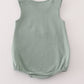 Green character applique bubble