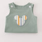 Green character applique bubble