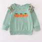 Sage pumpkin french knot ruffle top