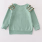 Sage pumpkin french knot ruffle top