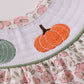 Pink pumpkin smocked floral ruffle bubble