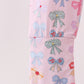 Premium whimsical bows ruffle bamboo romper