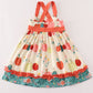 Platinum pumpkin print ruffle apron dress