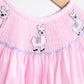 Pink alpaca hand smocked gingham girl romper