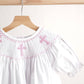 Pink easter cross hand-smocked girl dress