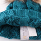 Teal pompom cable beanie