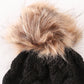 Black pompom cable beanie