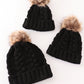 Black pompom cable beanie