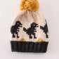 Black pompom dinosaur cable beanie