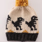 Black pompom dinosaur cable beanie