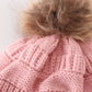 Pink pompom cable beanie