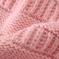 Pink pompom cable beanie