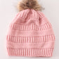 Pink pompom cable beanie