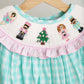 Mint christmas nutcracker hand smocked gingham bubble