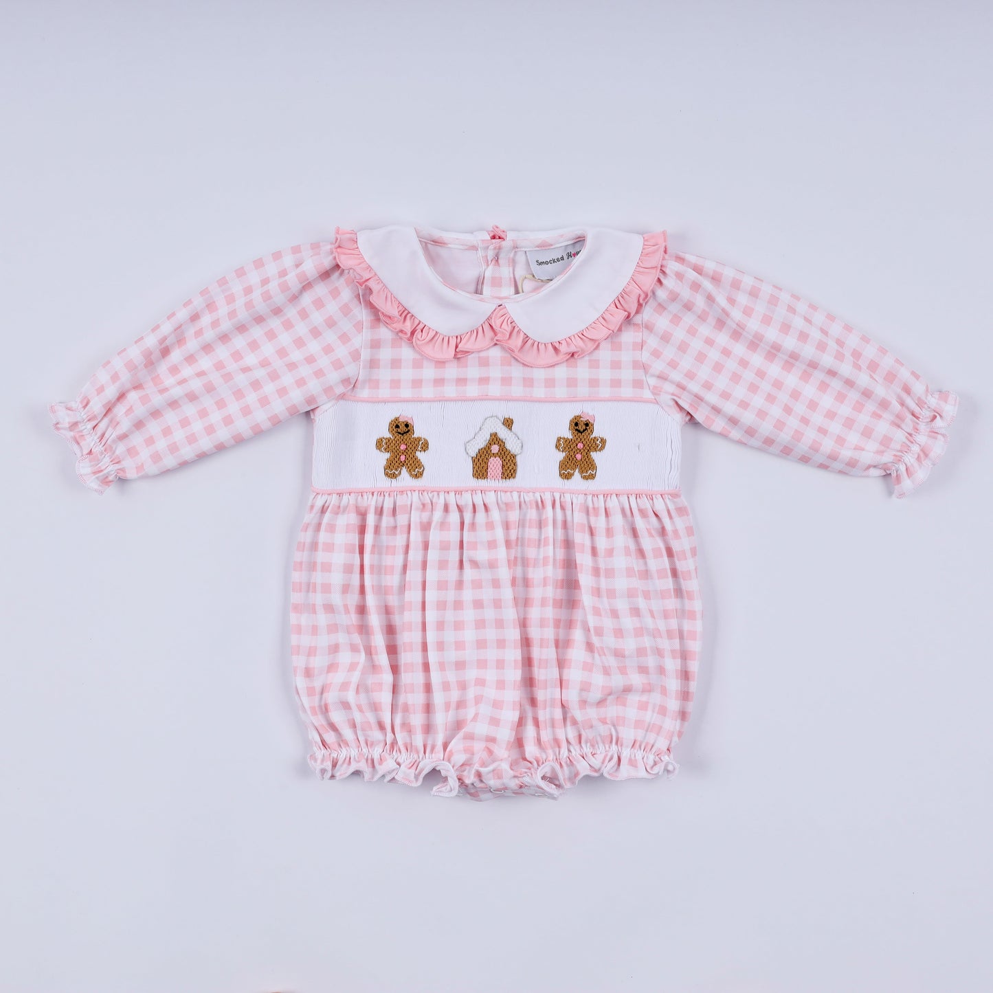 Pink gingerbread hand smocked gingham ruffle bubble