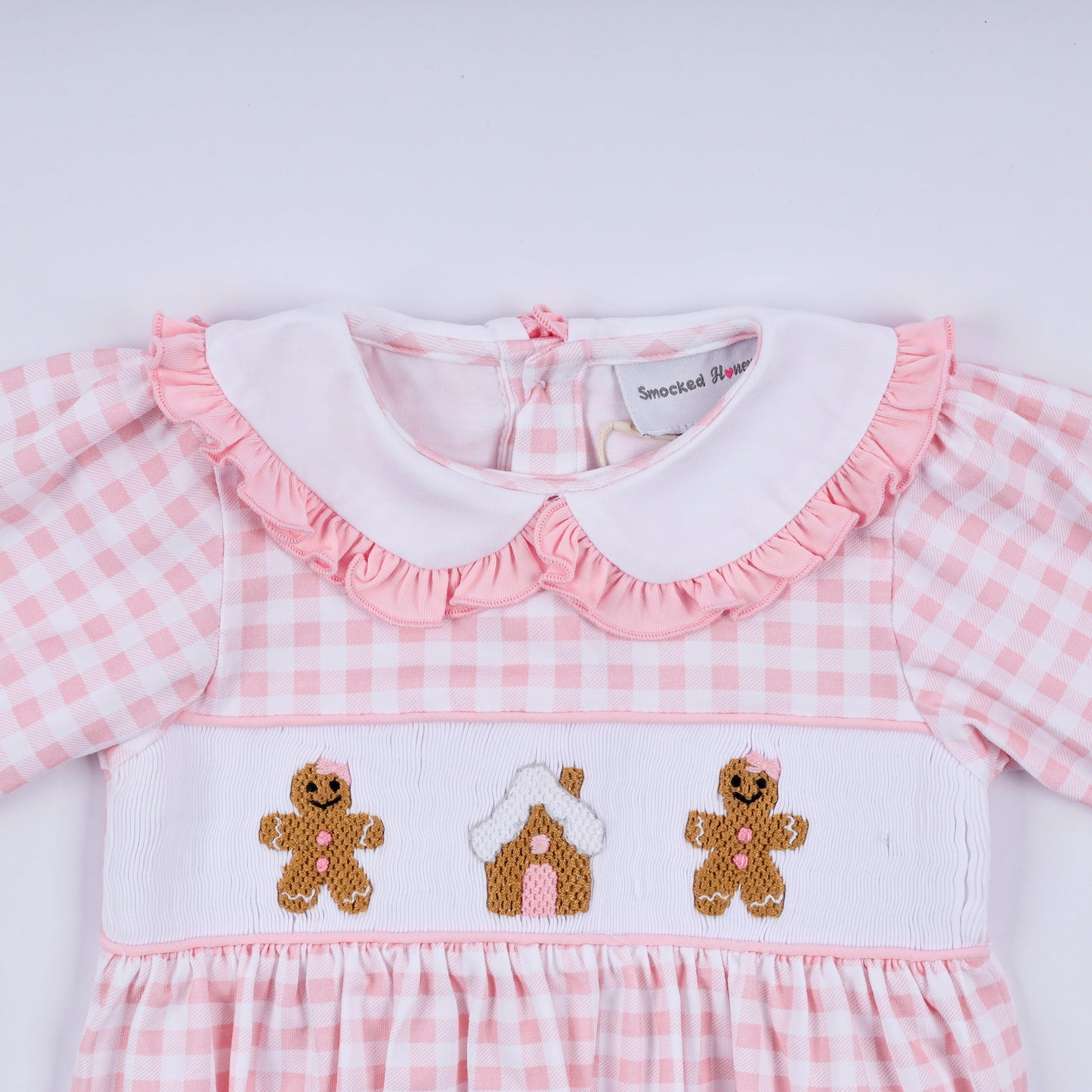 Pink gingerbread hand smocked gingham ruffle bubble