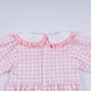 Pink gingerbread hand smocked gingham ruffle bubble