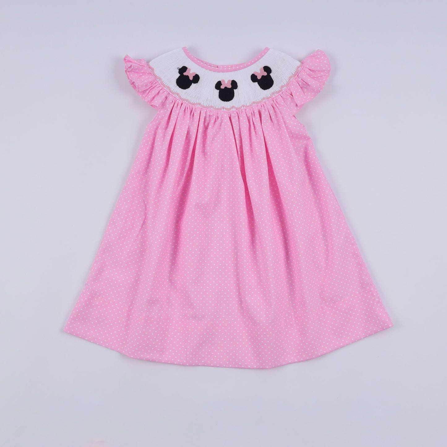 Pink character hand smocked dot ruffle dress