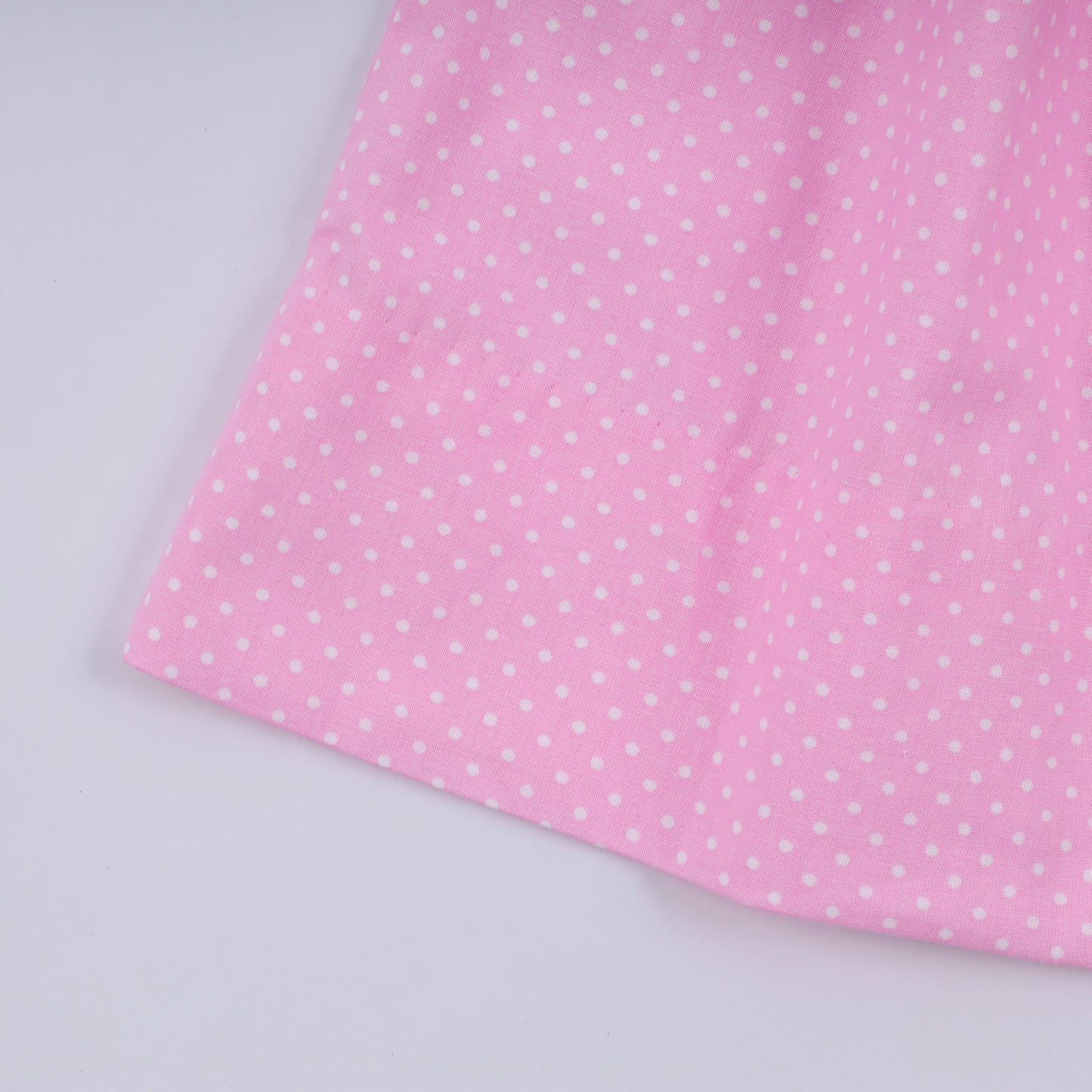 Pink character hand smocked dot ruffle dress