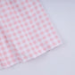 Pink character hand smocked gingham ruffle dress