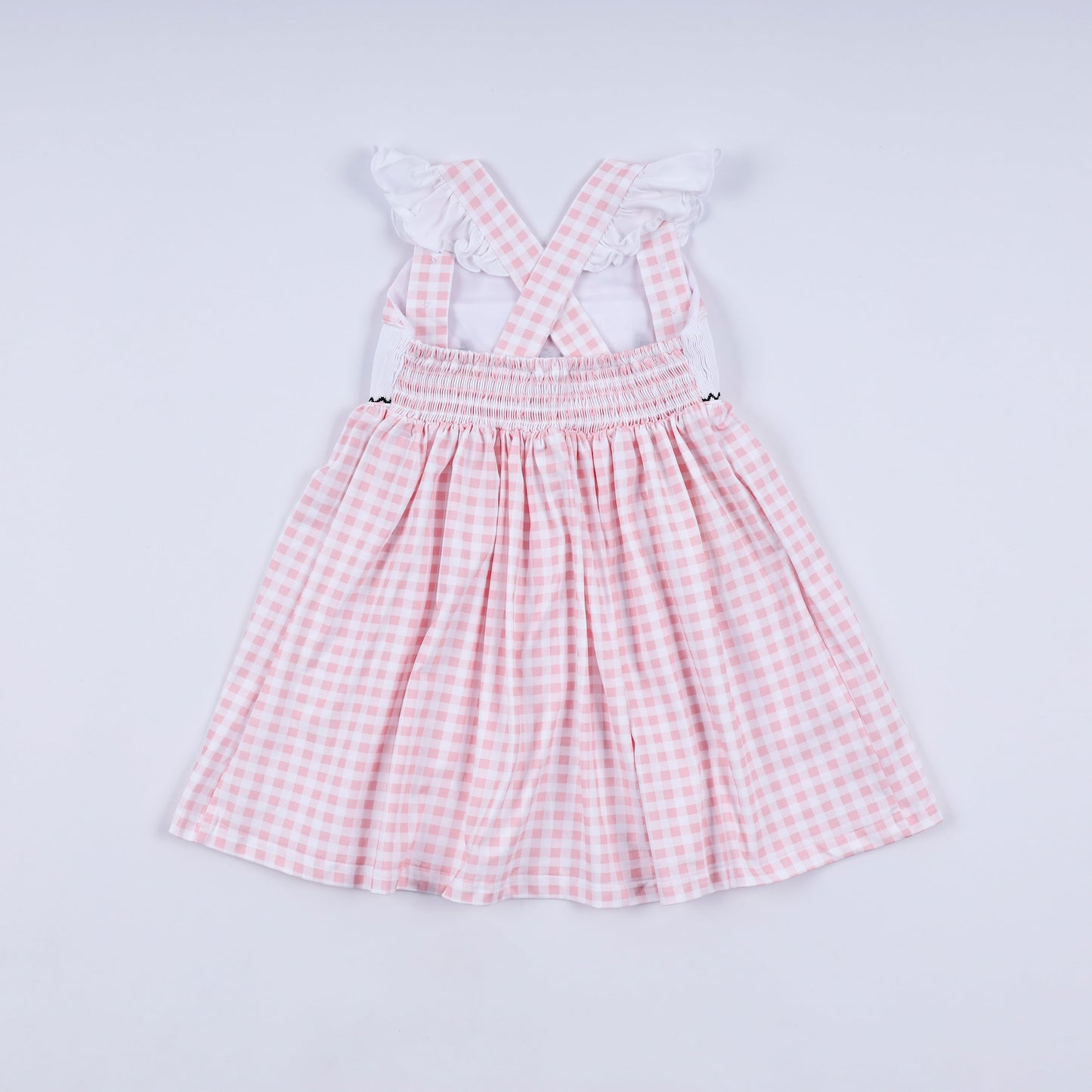 Pink character hand smocked gingham ruffle dress