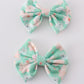 Green floral print girl piggie hair bow