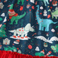 Green dinosaur print ruffle gown