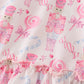 Pink nutcracker print girl ruffle gown