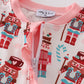 Pink christmas nutcracker print ruffle romper