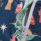 Navy nativity print ruffle romper