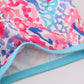 Tropical Sunset Waves swim trunks