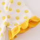 Yellow character applique dot romper