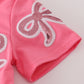 Pink bow sequin dress