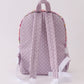 Purple floral print canvas ruffle backpack