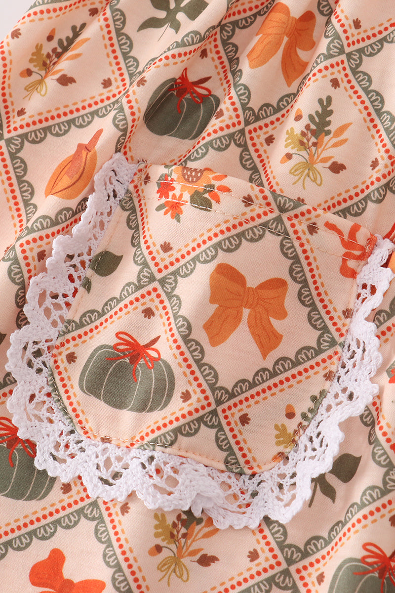 Green pumpkin bow print dress