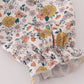 Floral embroidery smocked romper