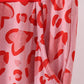 Red heart print bamboo pants