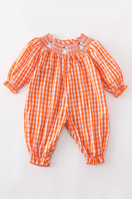 Orange smocked ghost romper