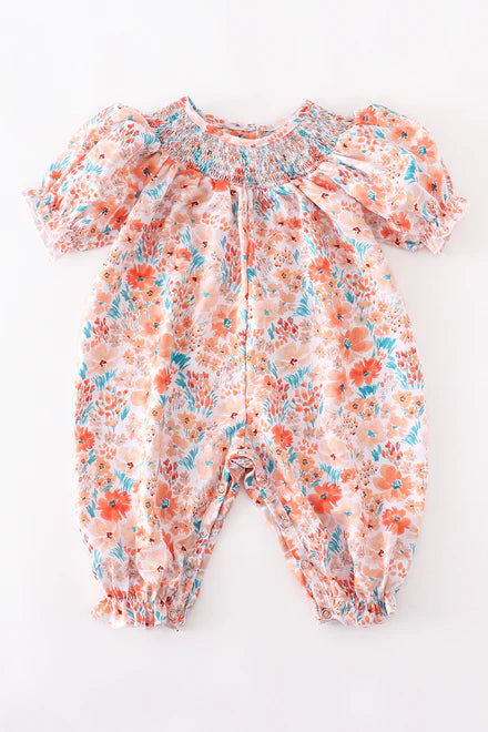Orange floral smocked romper